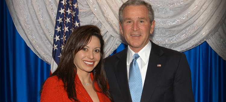 Teresa Madrigal of AGMS with President Bush